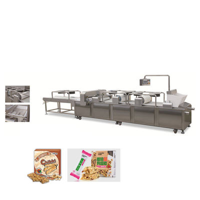 Bar de cuisine, friandise, barre d'écrou de raisin sec faisant la machine