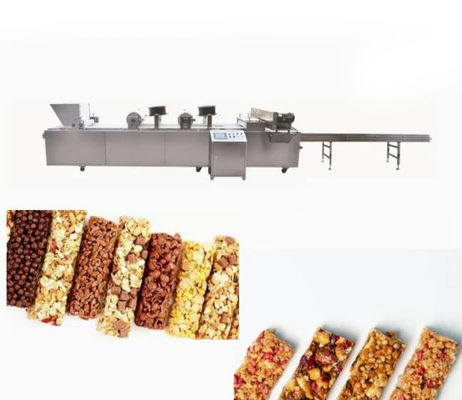 Le caramel traite, plat de sésame, barre de céréale faisant la machine/équipement