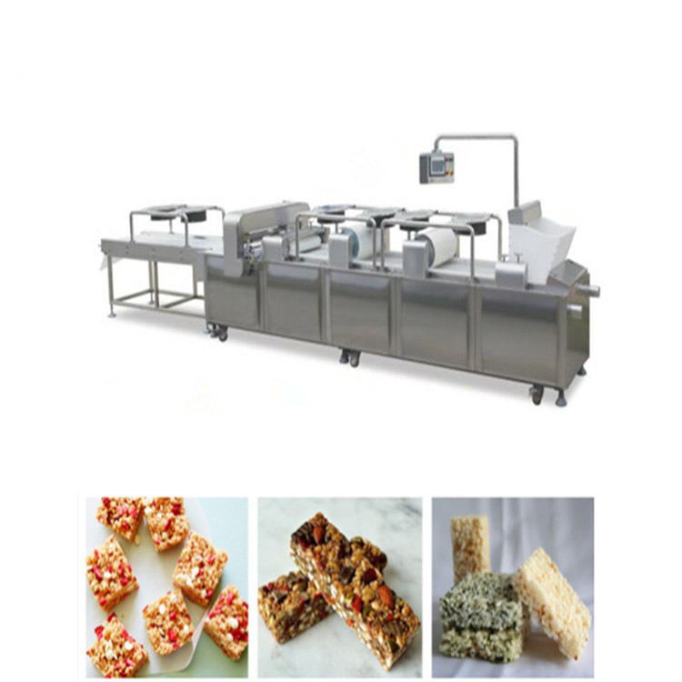 Bar de cuisine, friandise, barre d'écrou de raisin sec faisant la machine